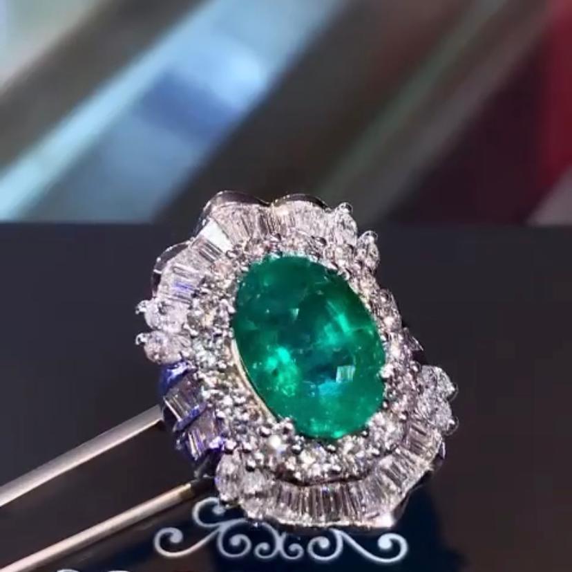 Oval Cut AIG Certified 6.50 Carats Zambian Emerald  3.60 Carats Diamonds 18K Gold Ring  For Sale