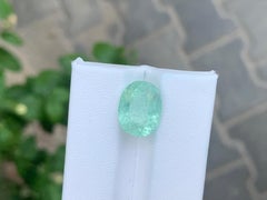 AIG Certified 6.99 Carat Natural Paraiba Tourmaline Oval Cut Loose Gemstone