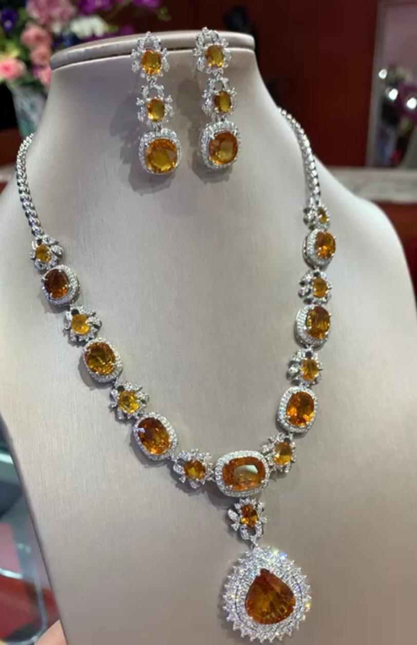 A gorgeous Parure in flowers design , so most beautiful style, perfect for glamour party and events. A very piece of art by Italian designer.
Necklace come in 18k gold with 17 pieces of natural orange Sapphires, in oval and pear cut , spectacular