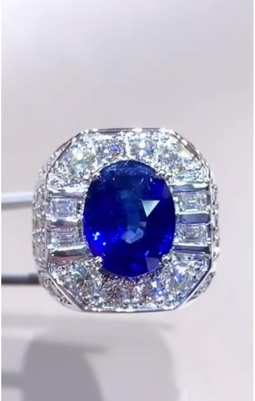 Transport yourself to another planet . The mesmerizing beauty of celestial  Blue color is encapsulated in our newest ring , presenting a 7,40 cts. Deep Royal Blue amidst a halo of glistening gemstones and diamonds.  
Magnificent ring come in 18k