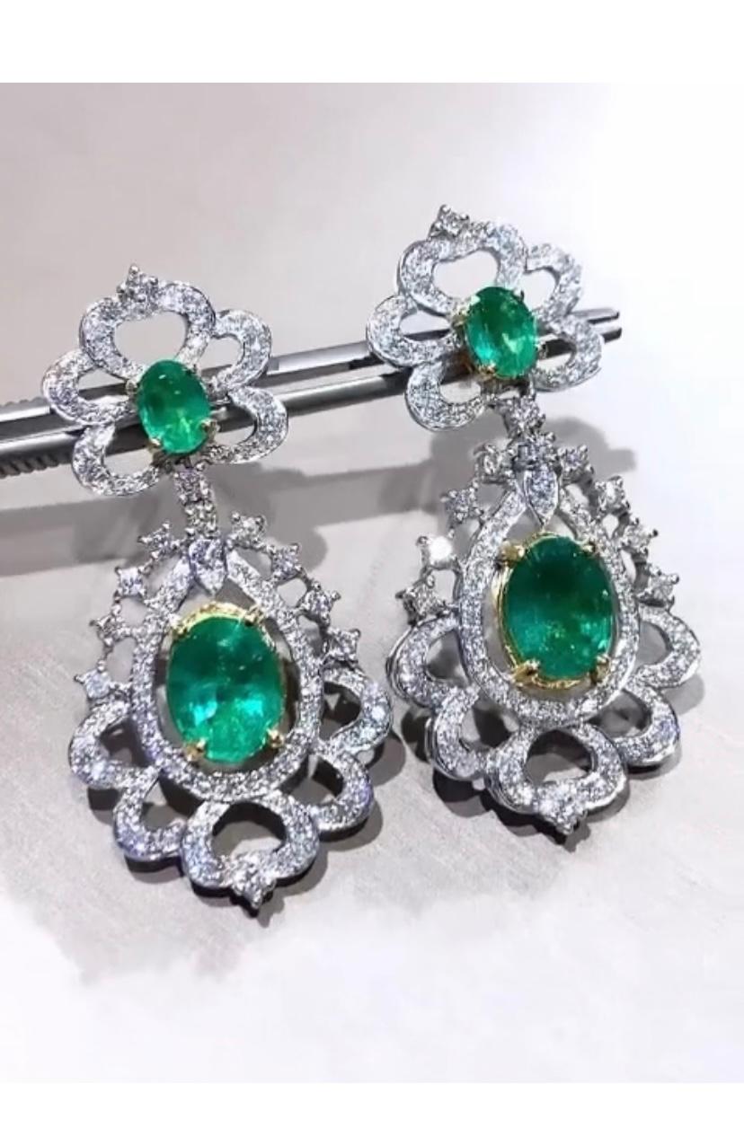 Unique and elegant Emeralds and Diamonds floral earrings.
The Emeralds are arranged in the shape of delicate flower, surrounded by shimmering diamonds that add a touch of sophistication.The intricate craftsmanship and vibrant colors make these