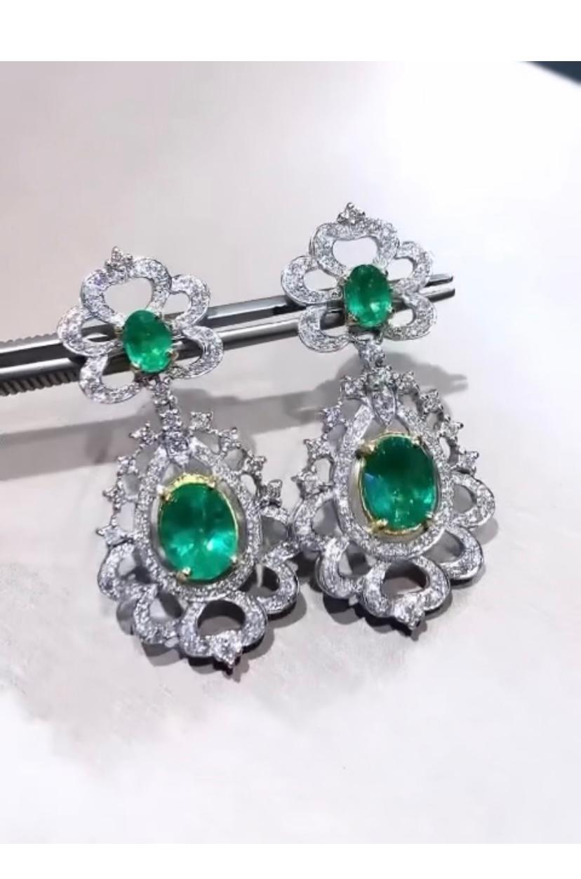 Oval Cut AIG Certified 7.50 Carats Zambian Emeralds 2.90 Ct Diamonds 18K Gold Earrings For Sale