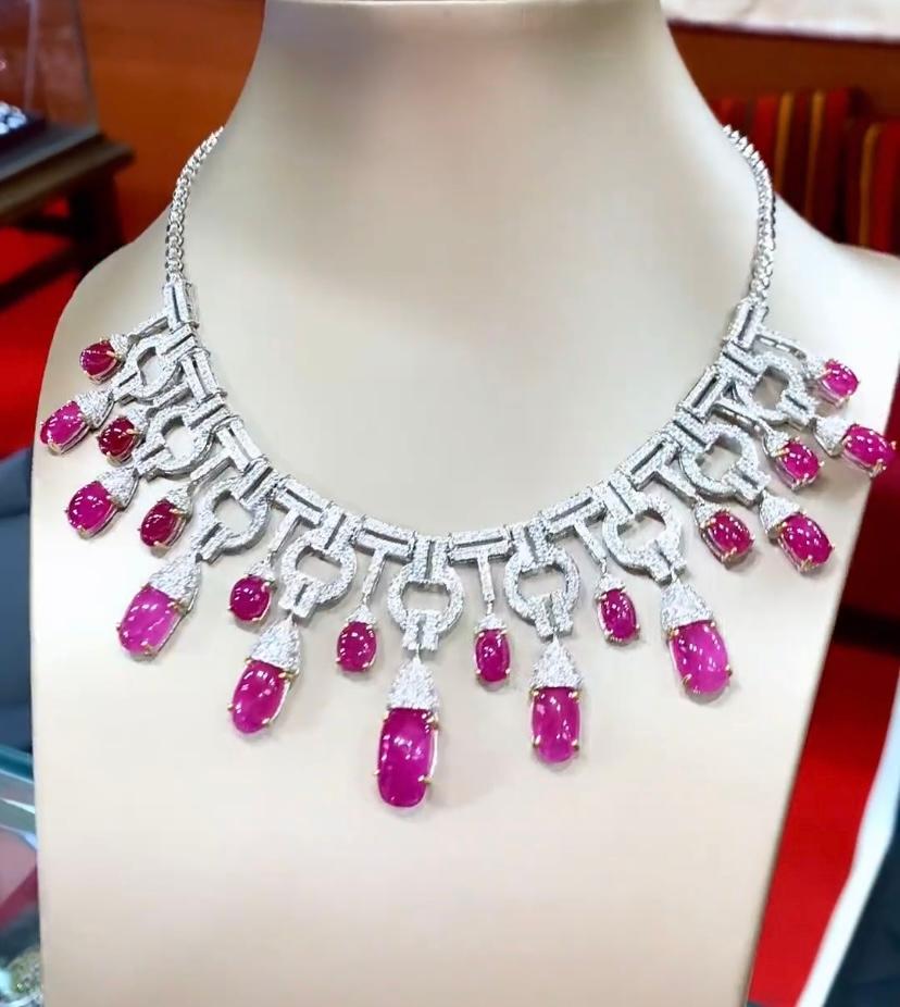 A magnificent necklace in Art Deco design, so stunning, a very adorable and refined style, a gorgeous piece of art., by Italian designer.
Necklace come in 18K gold with 19 pieces of natural Burma Rubies, in perfect cabochon cut , spectacular color,