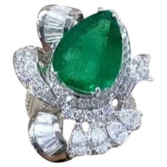Certificato AIG  8,00 carati di smeraldo dello Zambia 2,10 carati di diamanti Anello in oro 18 carati