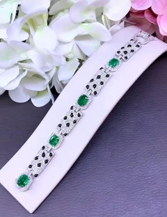 AIG-zertifizierte 8.60 Karat sambische Smaragde  Armband aus 18 Karat Gold mit 4,30 Karat Diamanten