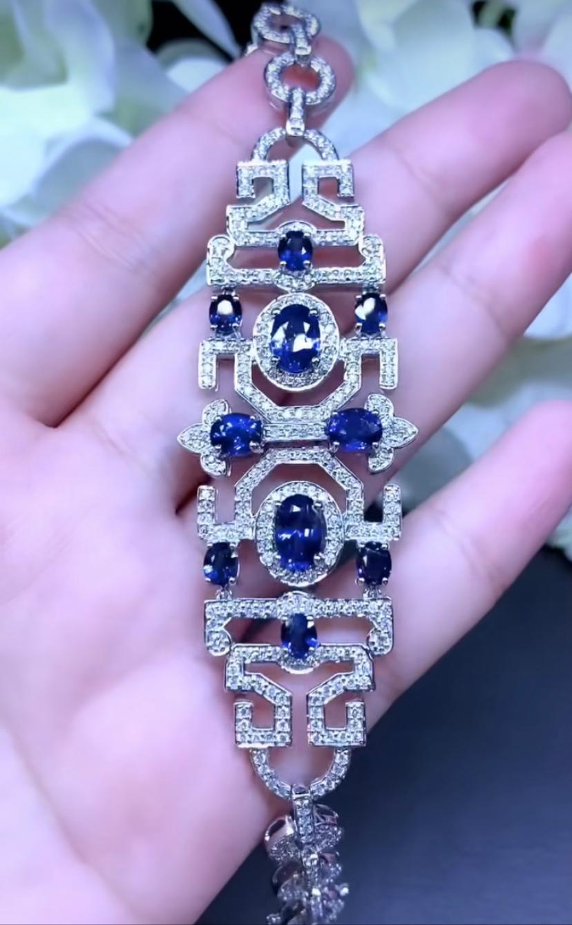 An exquisite design , so particular and refined, ideal style for sophisticated ladies.
Bracelet come in 18k gold with 10 pieces of natural Ceylon Sapphires in oval cut of 8,70 carats, and 352 pieces of natural diamonds in round brilliant cut of 3,25