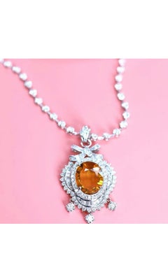 AIG Certified 8.90 Carats Thai Sapphire 4.40 Ct Diamonds 18K Gold Pendant