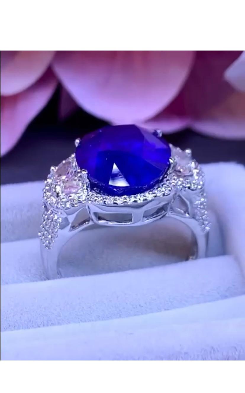 Oval Cut AIG Certified 9.03 Carats Ceylon Sapphire Diamonds 18K Gold Ring  For Sale