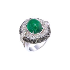 AIG Certified 9.34 Carat Zambian Emerald Cabochon & Black Diamond Ring