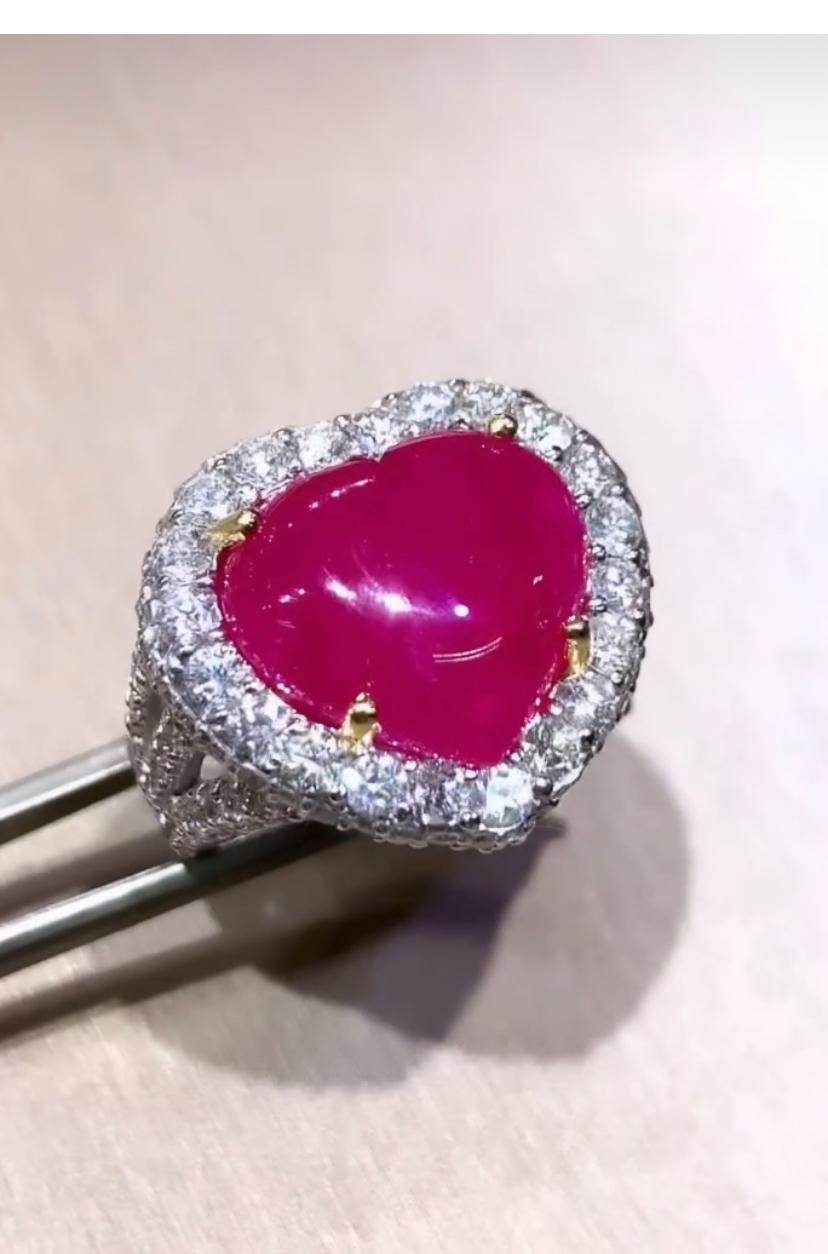 The Ruby in this mesmerizing ring , is a intense hot color, exuding captivating vibrancy. Its striking color is truly allure , drawing instant attention and leaving a lasting impression. 
Enhanced by the brilliance of meticulously arranged diamonds,