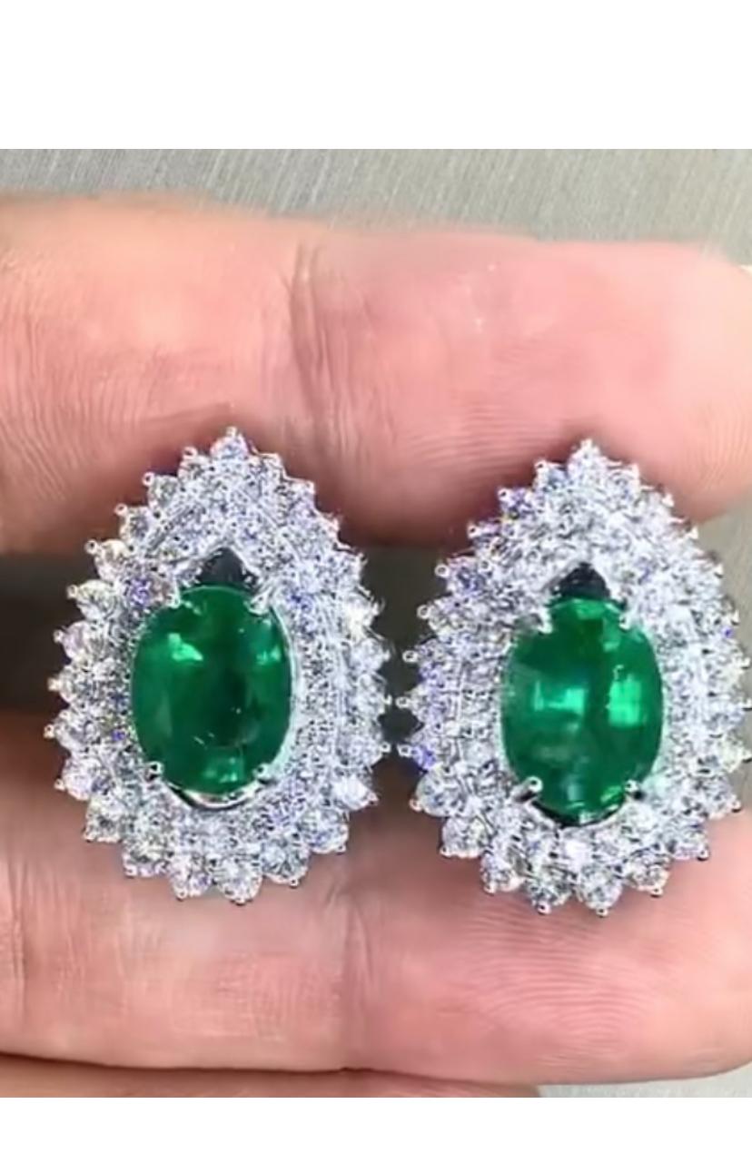 Oval Cut AIG Certified 9.50 Ct Zambian Emeralds 3.80 Ct Diamonds 18K Gold Earrings For Sale