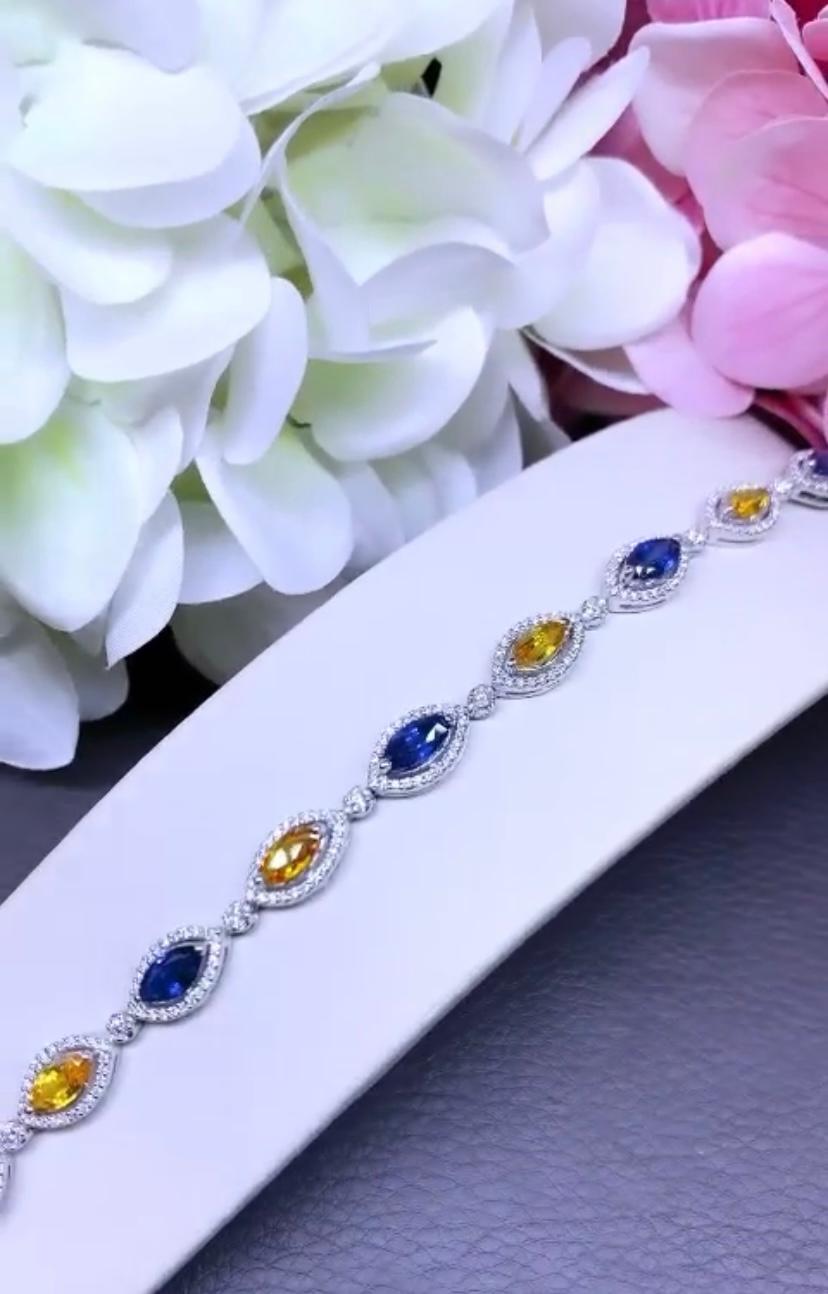 An exclusive contemporary design, so modern and essential style, perfect for every days .
Stunning bracelet come in 18K gold with 6 pieces of Ceylon Blue Sapphires, of 5,50 carats, extra fine quality, and 5 pieces of Orange Sapphires , of 4,30
