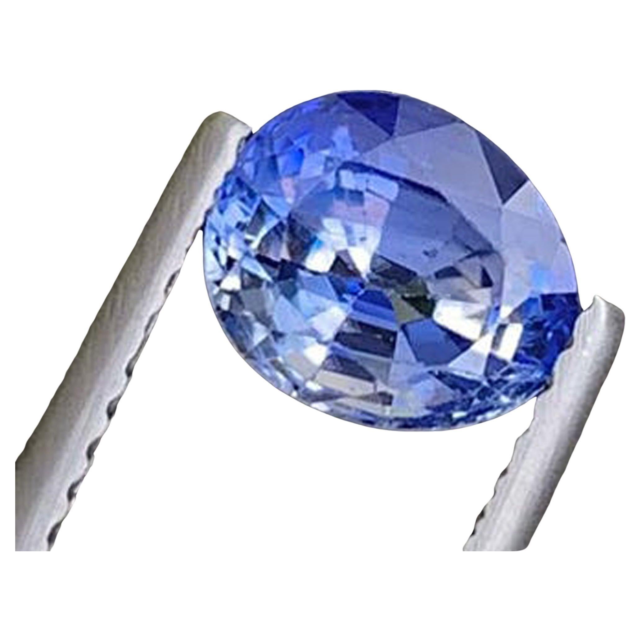 AIG-zertifizierter facettierter blauer Saphir: 1,86 Karat Bi Color Oval Schliff Edelstein im Angebot