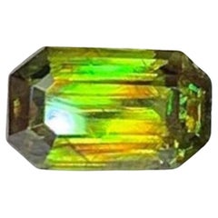 AIG Certified Green Chrome Sphene Titanite Gemstone: Emerald Cut 1.06 CT AIG Certified Green Chrome Sphene Titanite Gemstone: Emerald Cut 1.06 CT