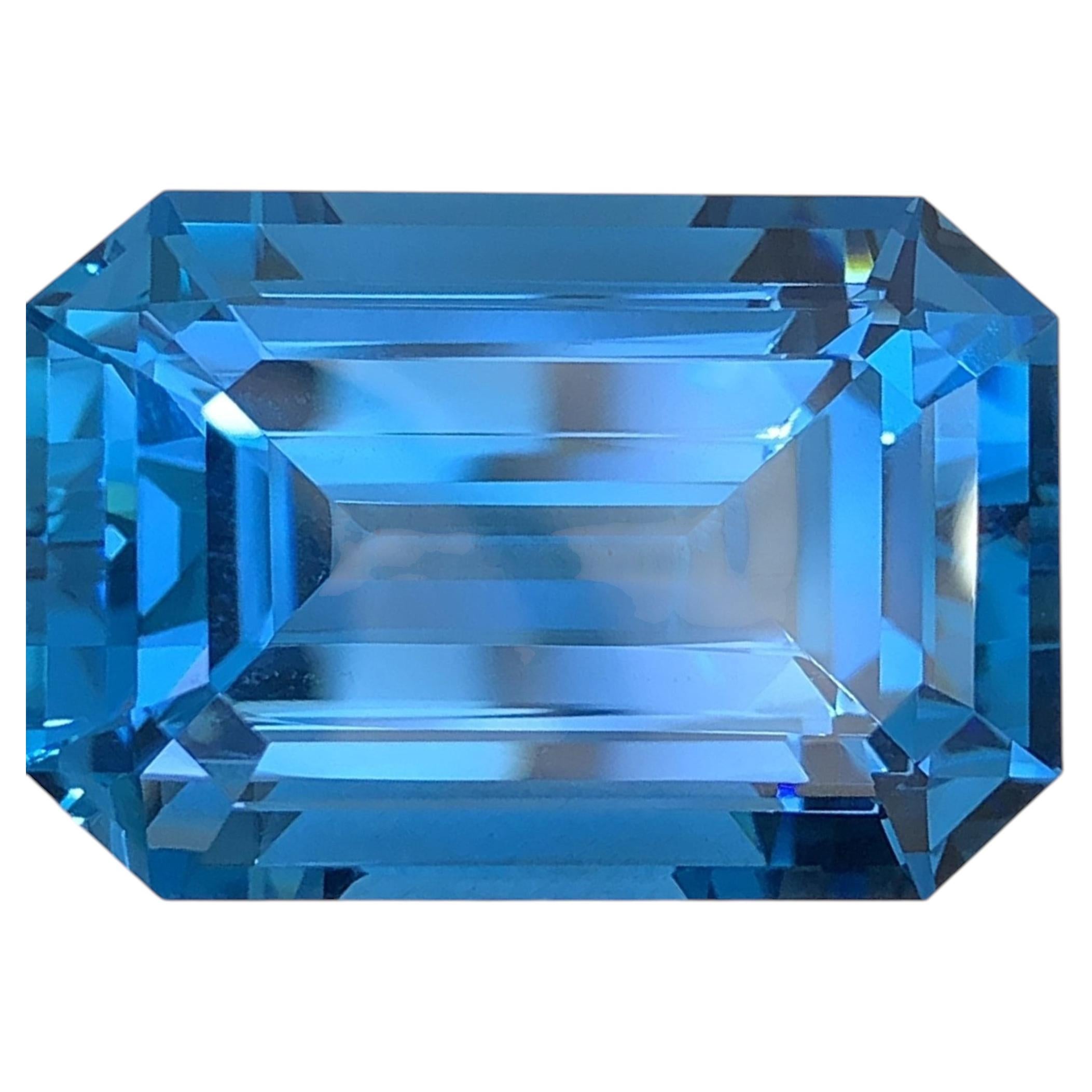 AIG Certified Natural London Blue Topaz Gemstone: 74.85 Carat Octagon Cut