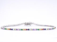 Bracciale tennis d'oro bianco certificato AIG con gemme multicolore