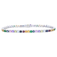 Bracelet tennis en or blanc avec pierres précieuses multicolores certifiées AIG