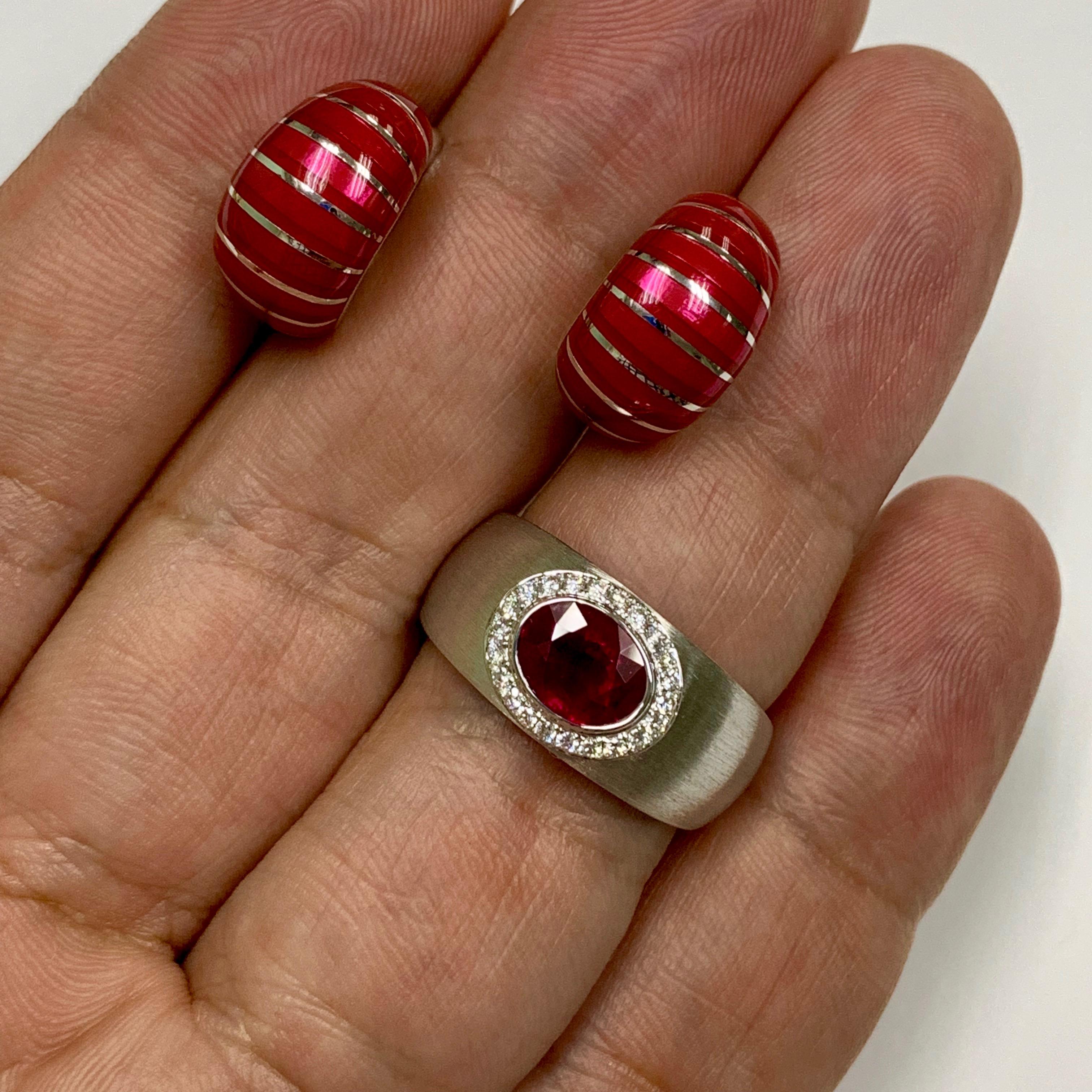 AIGL Certified 2,01 Carat Ruby Diamond Enamel 18 Karat White Gold Suite
Explore the infinite combinations of Kaleidoscope Collection. It's all about mixing and matching! Take a closer look at this spectacular Suite. Made from 18K White Gold, it