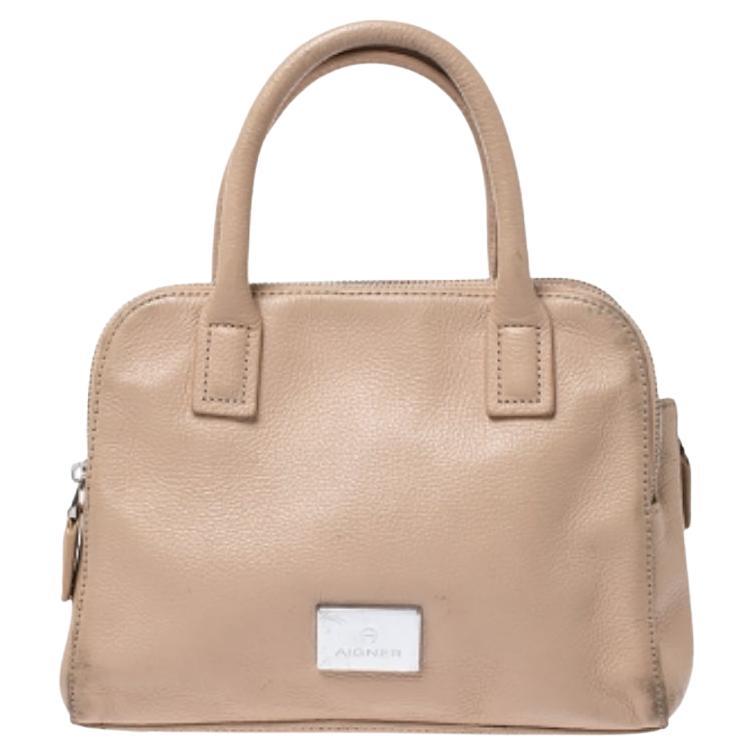 Borsa Aigner a doppio manico con zip in pelle beige in vendita