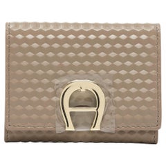 Portefeuille trifold Pria en cuir beige d'Aigner