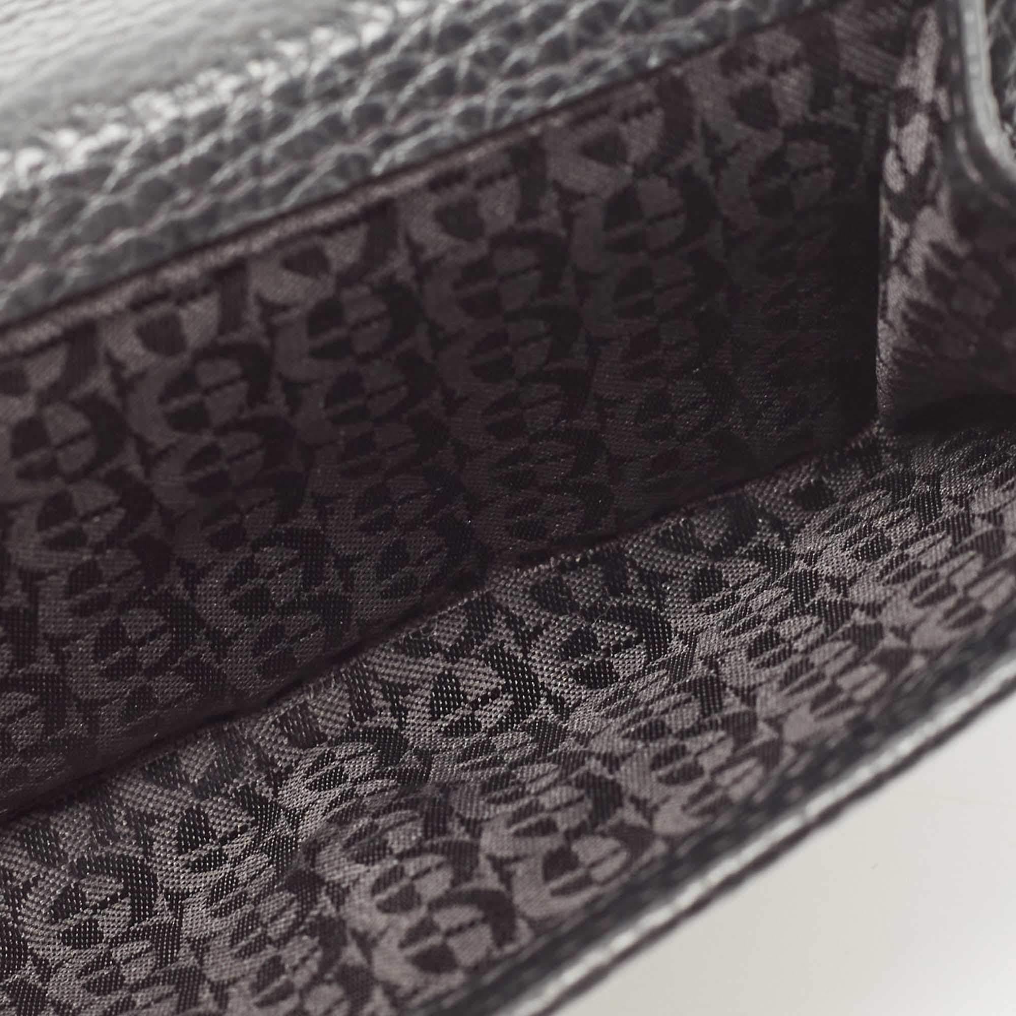 This wallet is a great everyday accessory. It is made from quality materials on the exterior and features a compartmentalized interior.