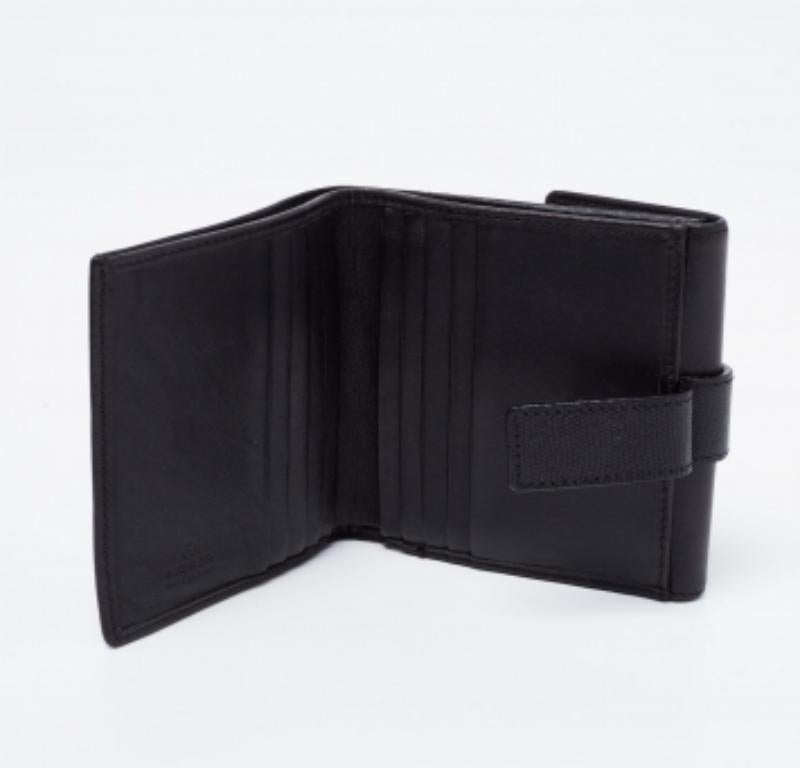 Portefeuille compact trifold en cuir noir d'Aigner en vente 1