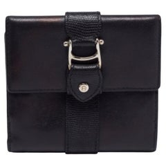 Cartera compacta tríptico de piel negra Aigner