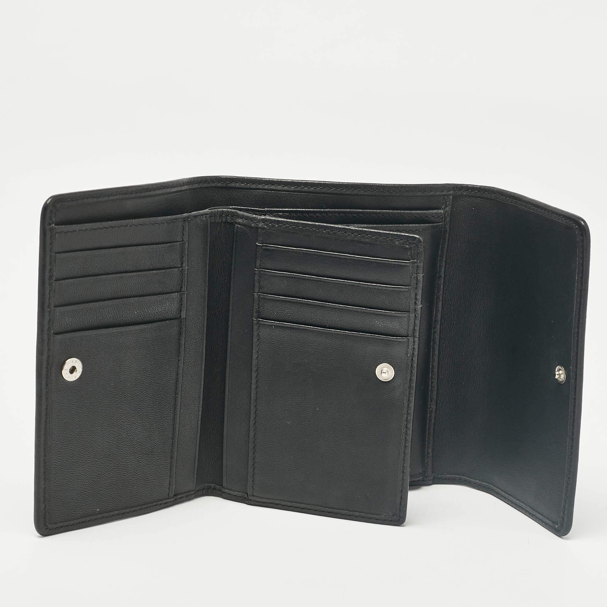 This designer wallet is an immaculate balance of sophistication and rational utility. It has been designed using prime quality materials and elevated by a sleek finish. The creation is equipped with ample space for your monetary essentials.