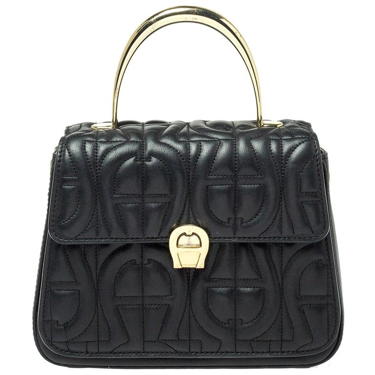 Aigner Black Signature Leather Genoveva Top Handle Bag at 1stDibs | aigner  genoveva, aigner black bag, aigner handle bag black