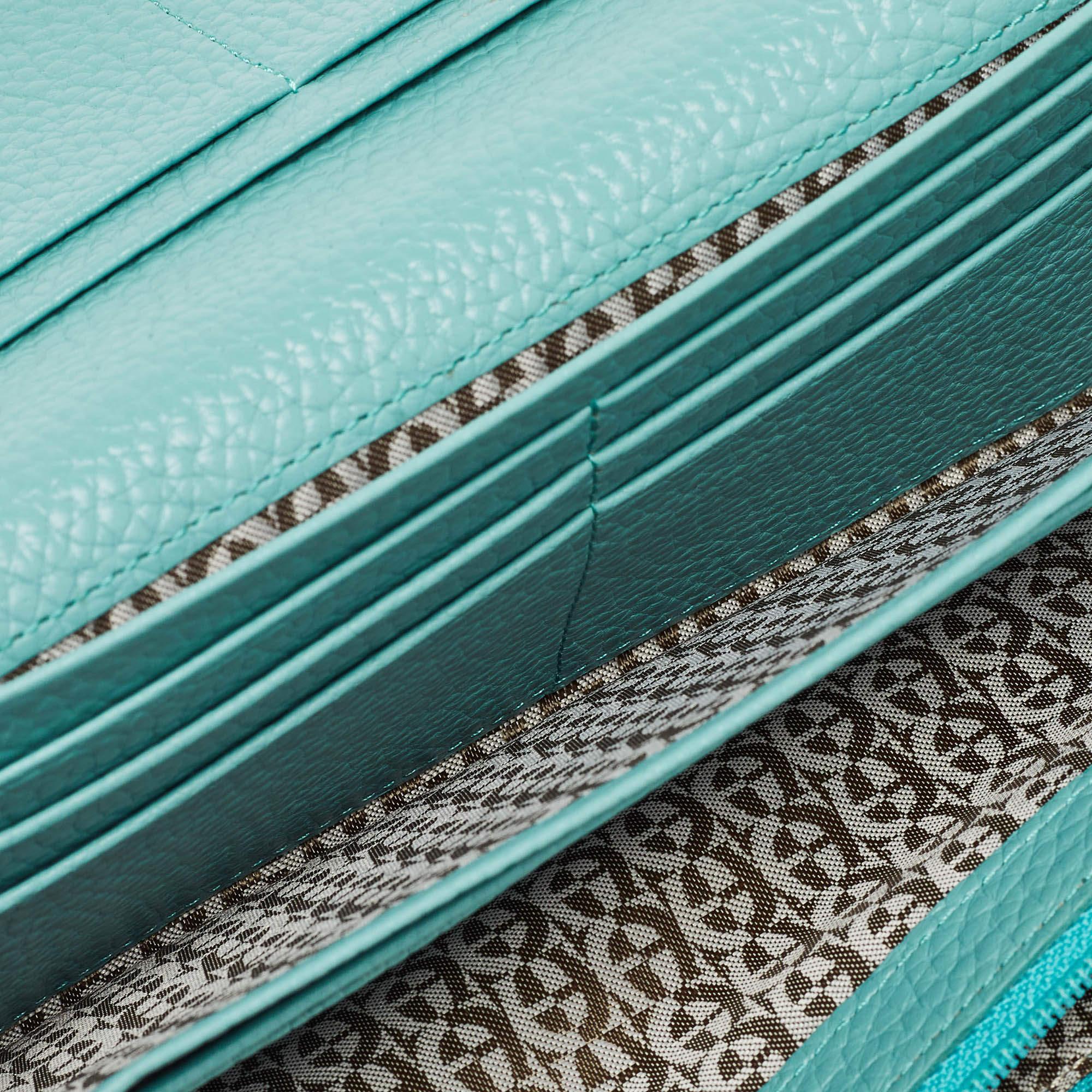 This Aigner blue wallet effortlessly combines meticulous construction with ageless style making it a symbol of refined taste. Elevate your accessory collection with this designer piece.