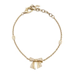 Pulsera Aigner Lazo Cristales Tono Oro