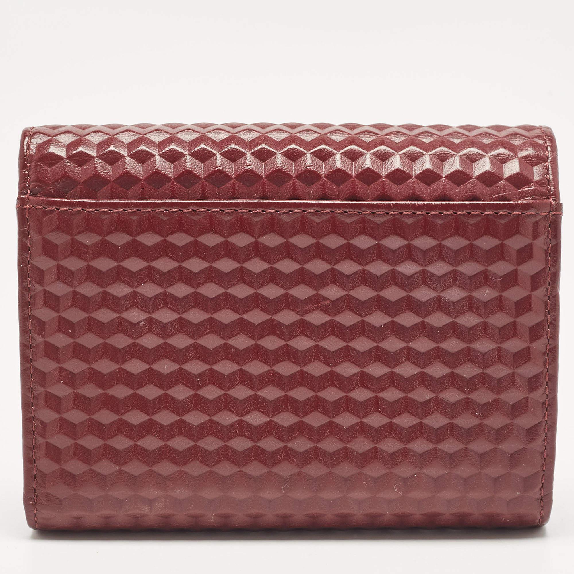 Aigner Burgundy Embossed Leather Genoveva Trifold Compact Wallet In Good Condition For Sale In Dubai, Al Qouz 2