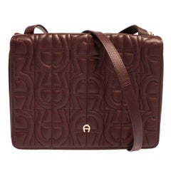 Aigner Burgundy Logo Embossed Leather Flap Crossbody Bag