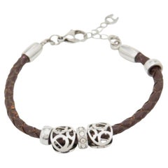 Aigner Crystal Logo Charm Brown Braided Leather Bracelet