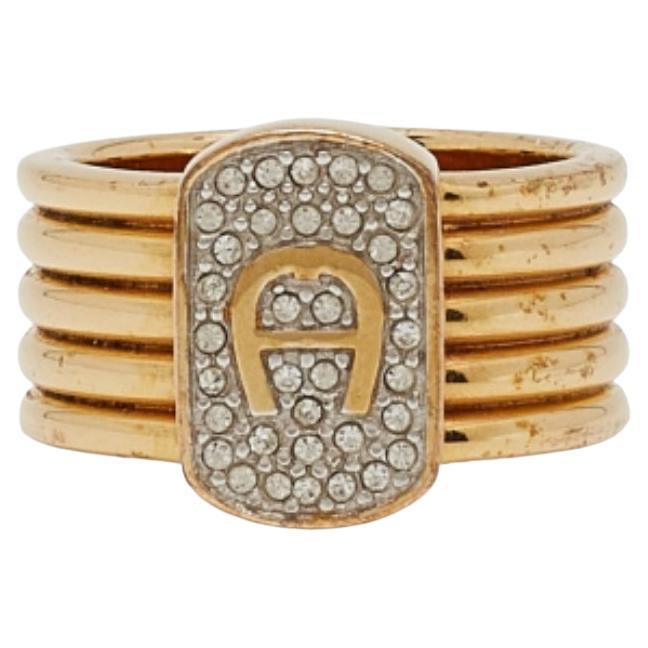 Aigner Anello con Logo in cristallo in tonalità oro misura 54 in vendita