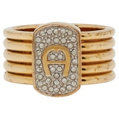 Aigner Gold Tone Crystal Logo Band Ring Size 54