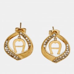 Aigner - Boucles d'oreilles avec logo en or et détails en cristal