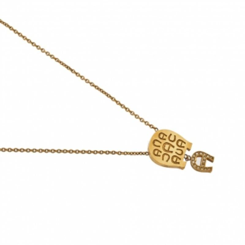 Aigner Gold Tone Mother of Pearl Crystal Logo Pendant Necklace In Fair Condition For Sale In Dubai, Al Qouz 2