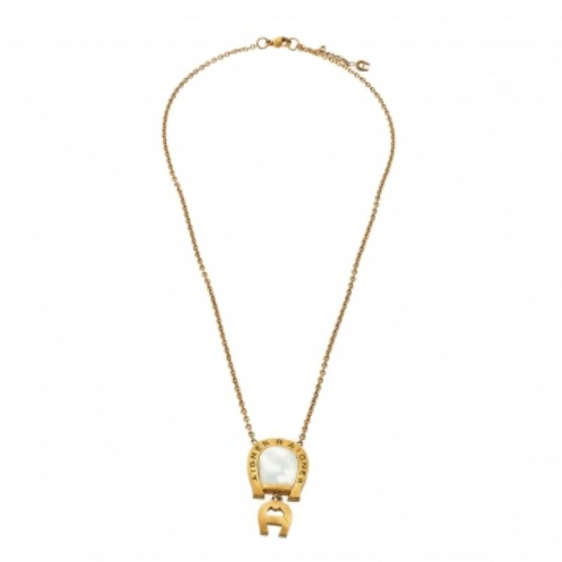 Aigner Gold Tone Mother of Pearl Crystal Logo Pendant Necklace For Sale