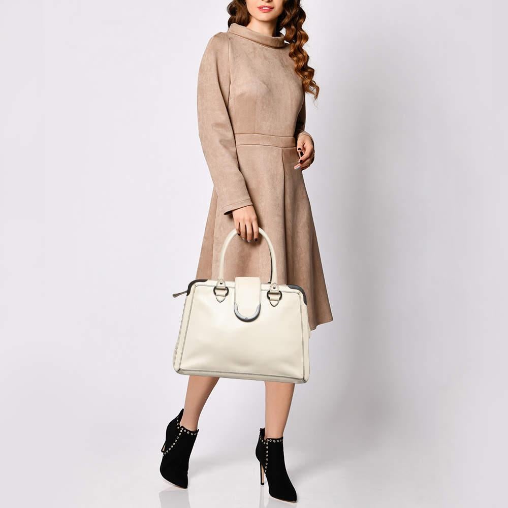 This satchel is rendered in the finest quality materials into an elegant design. Versatile and functional  it is well sized for your daily use.

