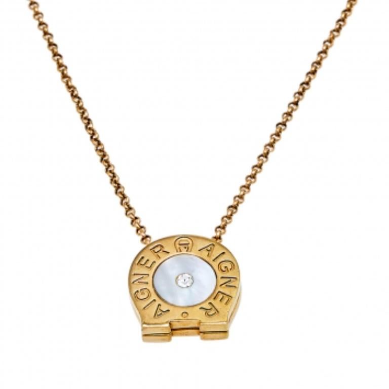 Donna Aigner Collana in metallo dorato con cristalli di madreperla in vendita