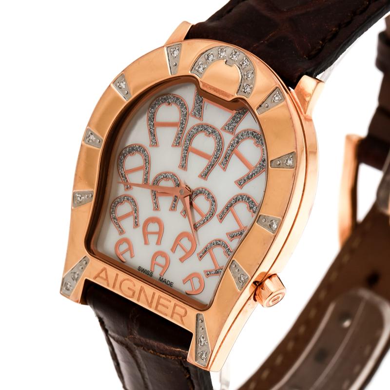 Aigner's 'Verona' women's wristwatch features a uniquely designed dial & bezel, both accented by gleaming diamonds. The dial is inlaid with mother of pearl and features several A motifs, the label's trademark. It comes with a leather strap secured