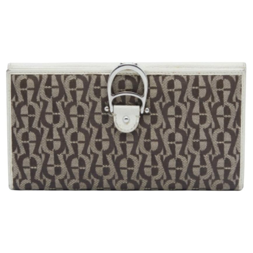Cartera Continental Aigner de Piel Marrón/Blanco roto y Lienzo de Firma