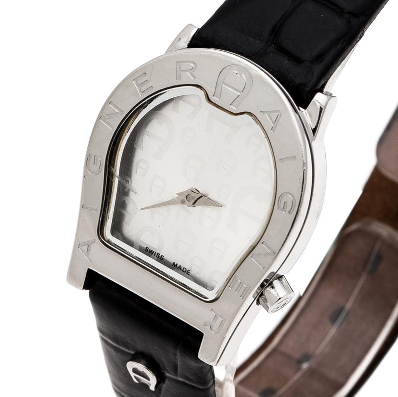 This watch from the house of Aigner is cast in a stainless steel case with a diameter of 24mm. It features the case in the brand's logo shape with the brand name engraved on the bezel. The monogram silver dial has two hands and lastly, the quartz