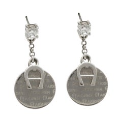 Aigner - Pendants d'oreilles en cristal argenté