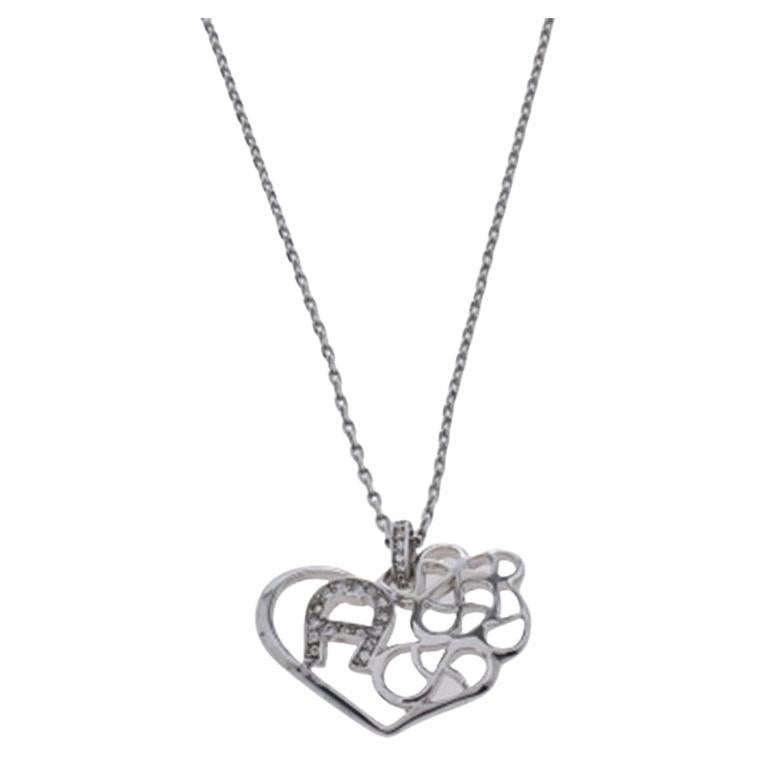 Aigner Silver Tone Crystal Logo Heart Pendant Necklace For Sale