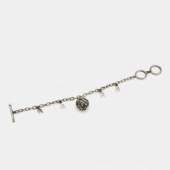 Aigner Sterling Silver Sterling Crystal Logo Charm Bracelet