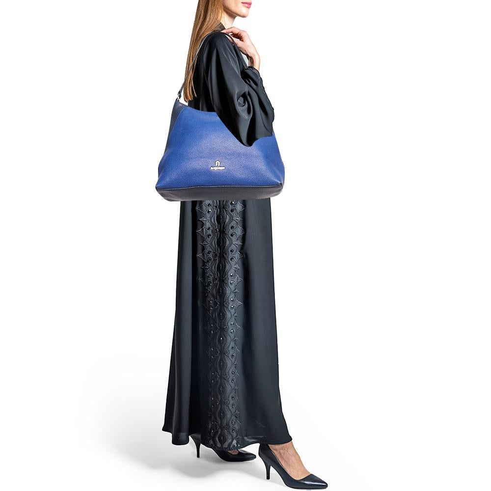 Stylish handbags never fail to make a fashionable impression. Make this designer hobo yours by pairing it with your sophisticated workwear as well as chic casual looks.