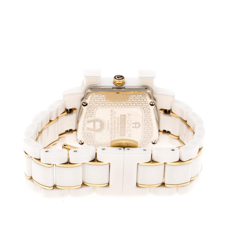 Designed for the modern-day women, this Aigner watch is an ideal choice for women who like to keep it classy and stylish. This Genua Due watch from the house features a white ceramic and two-tone stainless steel body with 33 MM case diameter and a