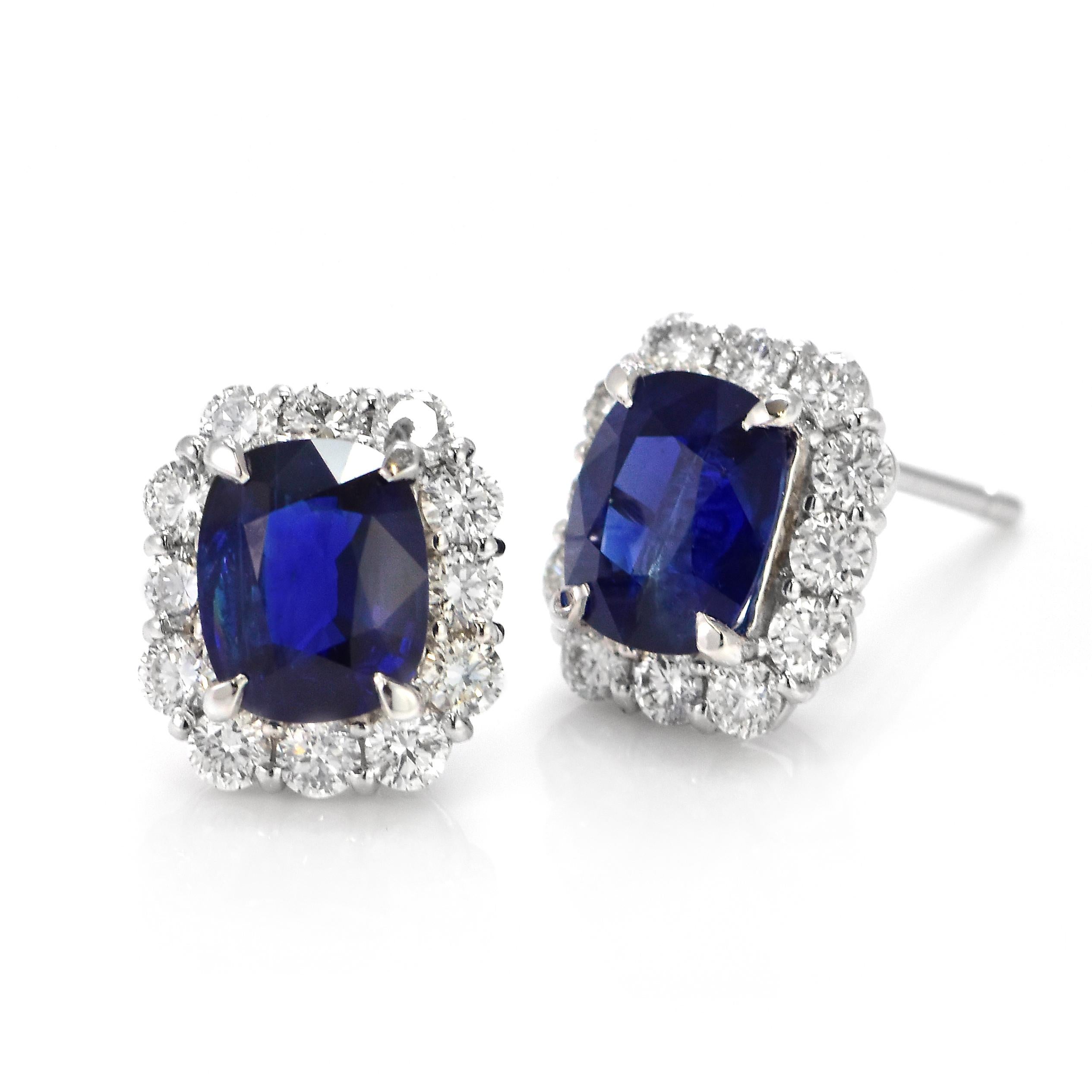 A beautiful pair of earrings featuring a total of 2.29 Carat Natural, Burmese, Royal Blue Sapphires and 0.70 Carats Diamond Accents made in Platinum. Sapphires have extraordinary durability - they excel in hardness as well as toughness and